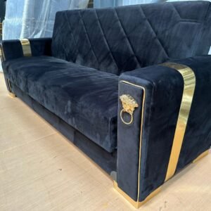 Celeste Sofa Bed with black velvet upholstery and gold accents.