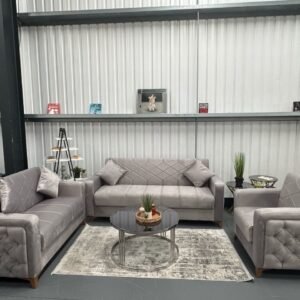 Graphite Haven Sofa Bed with matching armchairs in an industrial setting.