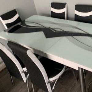 ReflectaTone Dining Set with a glass table and six chairs featuring black and white design elements.