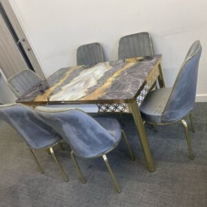 SlateEdge Dining Set with marbled tabletop and gray upholstered chairs.