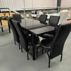 SleekAura Table Set with black glass table and six black upholstered chairs.
