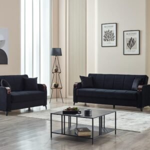 Modern living room with dark blue sofas, minimalist decor, and framed artwork.