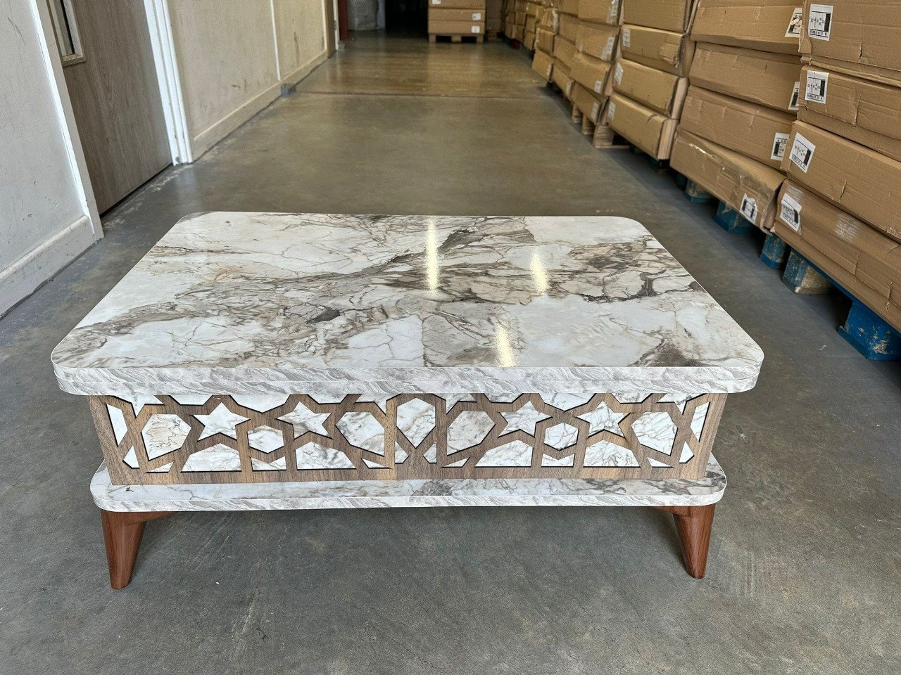 TitanGold Coffee Table with a marble top and star-patterned wooden border.