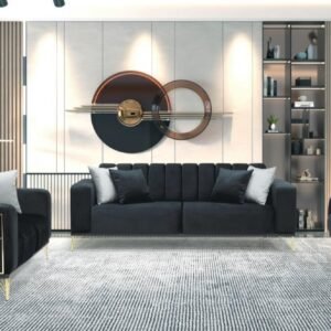 Modern living room with black furniture, geometric art, and built-in shelves.