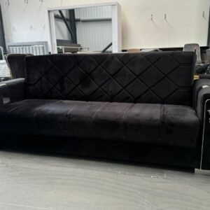 Velora Black Sofa Bed with diamond-patterned tufting and silver embellishments.