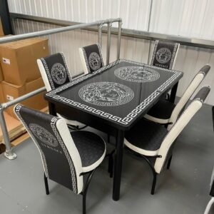 VogueLine Modern Dining set with black and white patterned table and chairs.