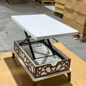 White convertible table with liftable top and decorative panels.