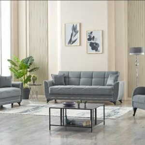 Modern living room with a gray sofa, matching armchairs, a coffee table, and wall art.