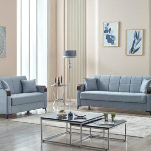 Modern living room with grey sofas, minimalist decor, and framed artwork.